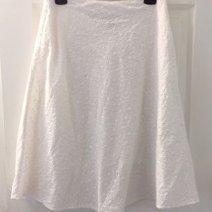 Eyelet white knee length skirt. Size 4